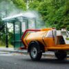 Cleaning bus stop with Bowser pressure washer